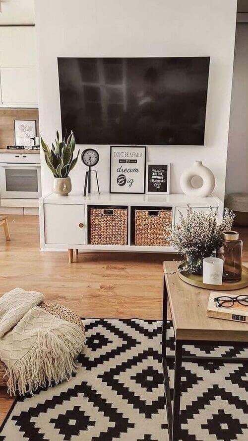 Statement rug defines zones in a compact living space