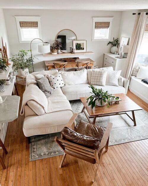 Efficient open-concept layout with wall-mounted dining table for space optimization