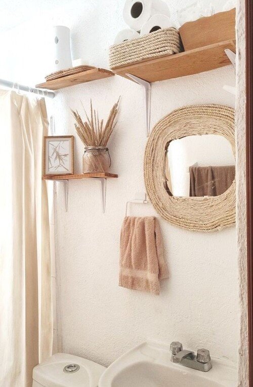 Coastal boho: sand-toned palette with nautical-inspired mirror