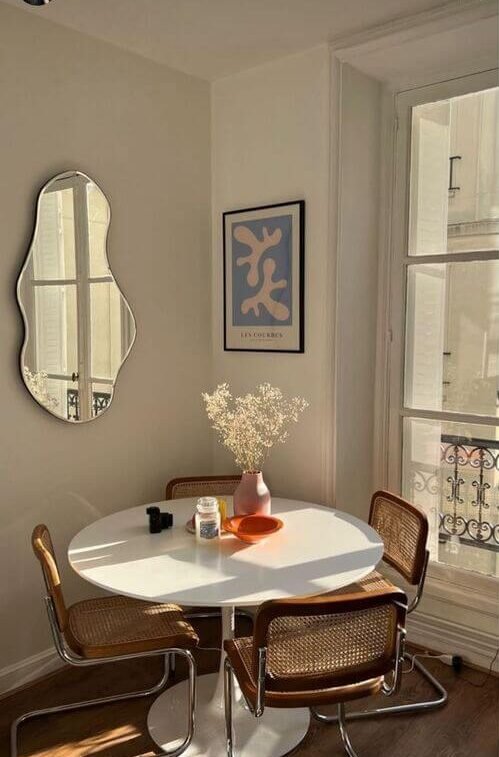 Space-saving circular dining table perfect for cozy living areas