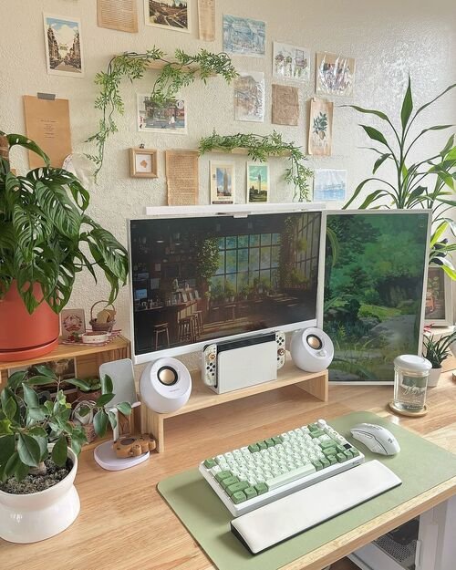 Create a fresh and airy workspace with mint and white desk decor