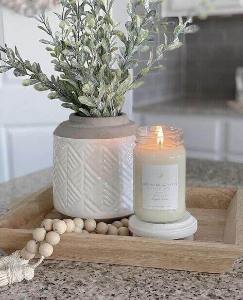 A serene arrangement of candles and neutral accents