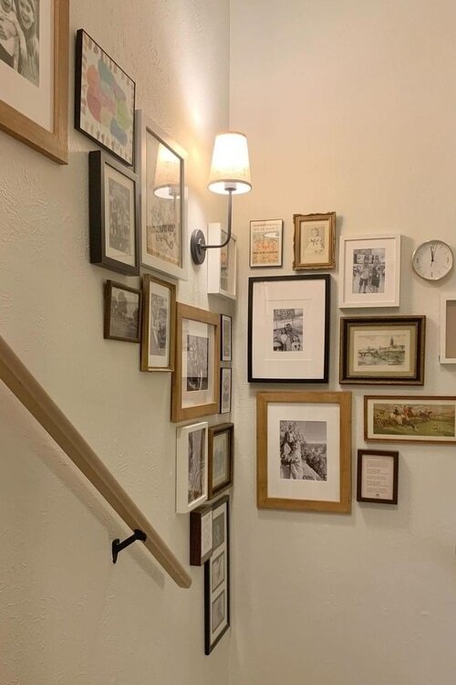 A curated mix of vintage frames with family photos and memorabilia