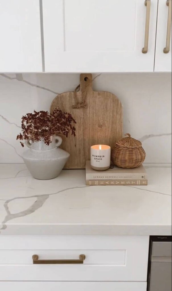 A rustic pairing of chopping boards and candles