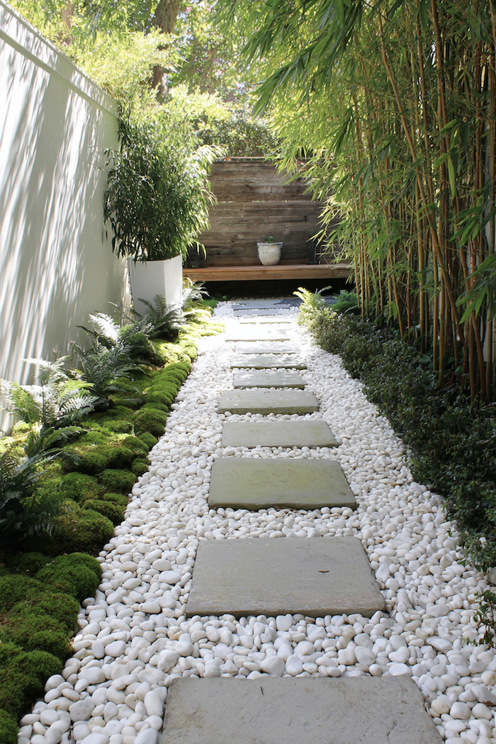 Create a serene garden walk with a pathway blending stone and pebble textures