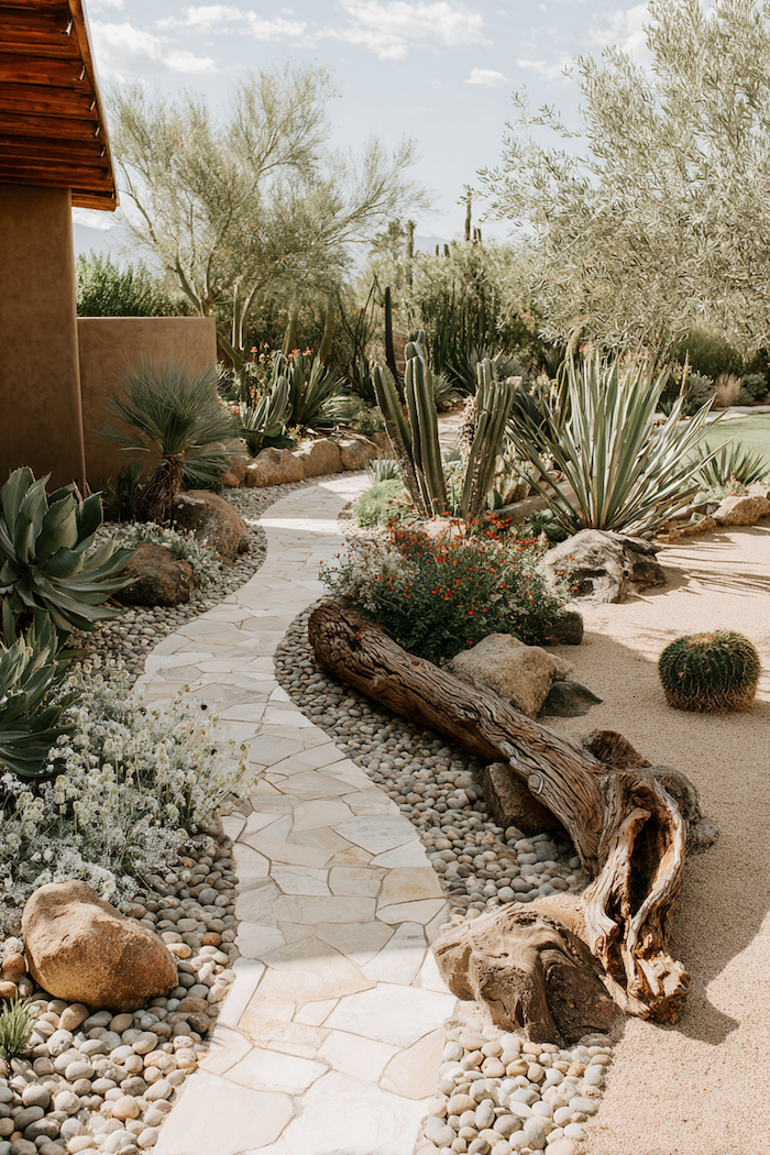 Add organic charm to your garden with a gracefully curved pathway combining stone and gravel
