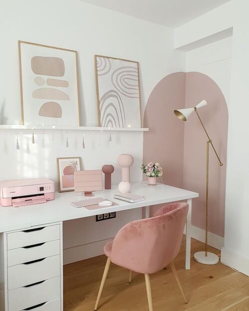 Blend warmth and charm with pink decor and natural wooden accents