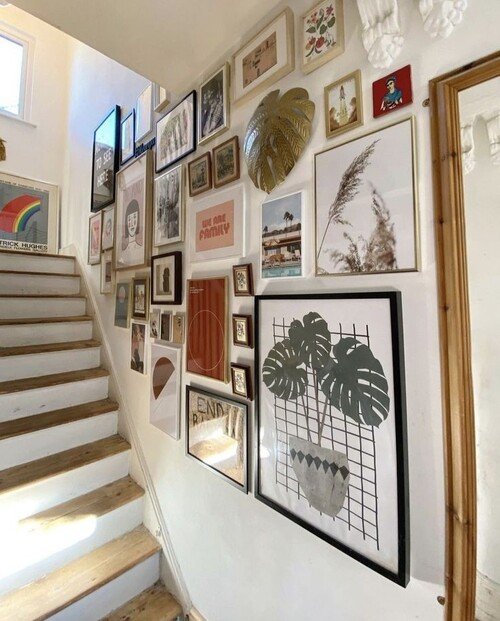 An eclectic mix of art styles and sizes